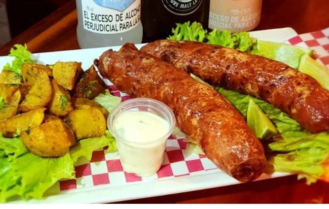 Longaniza (longaniza ahumada con porción de papa criolla en finas hierbas)